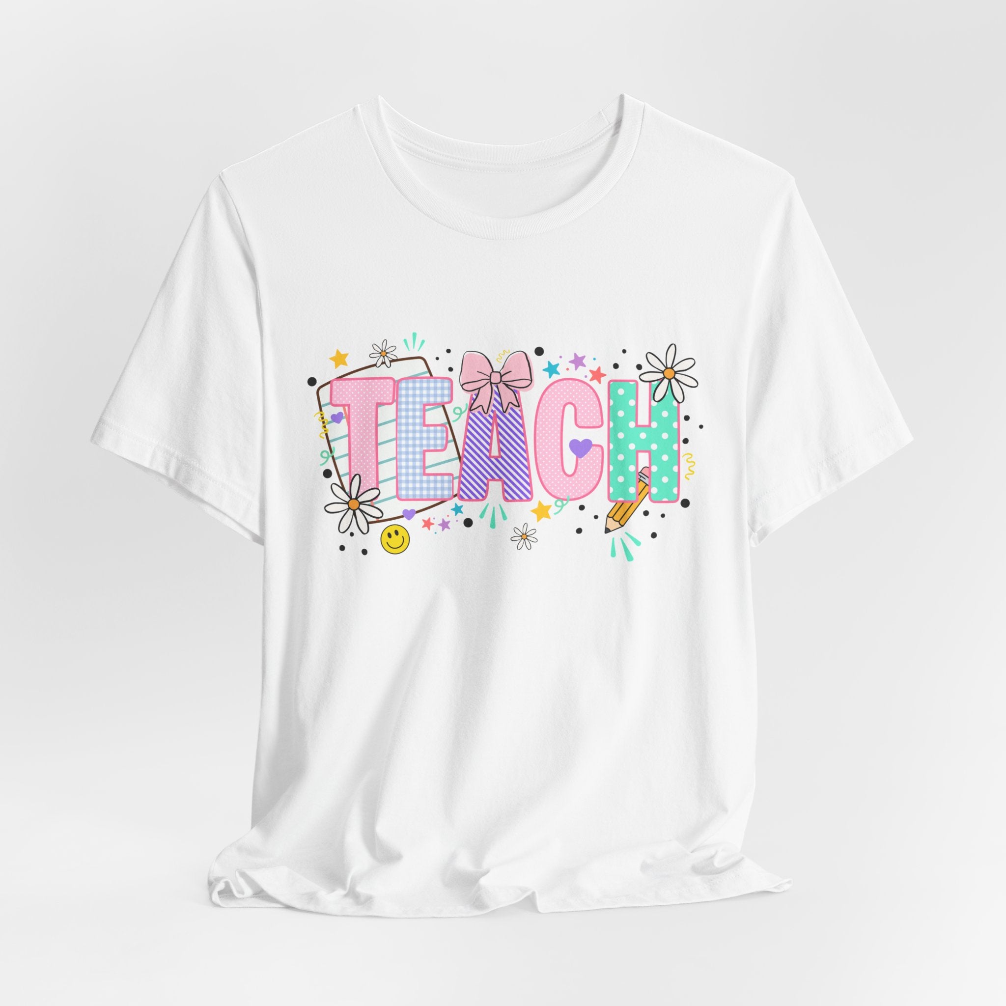 Teach Floral Graphic Tee — Cute Pastel "TEACH" Teacher T‑Shirt