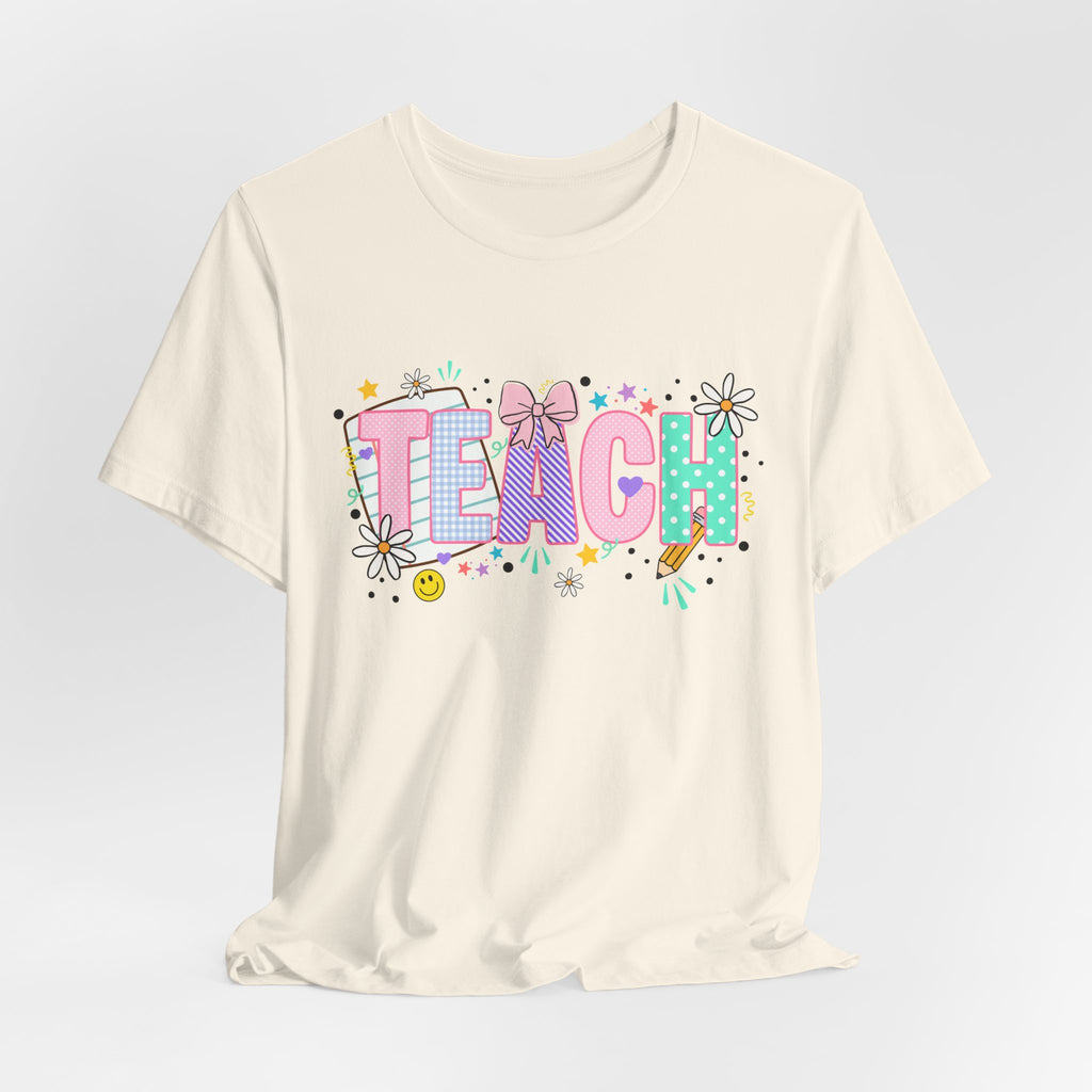 Teach Floral Graphic Tee — Cute Pastel "TEACH" Teacher T‑Shirt