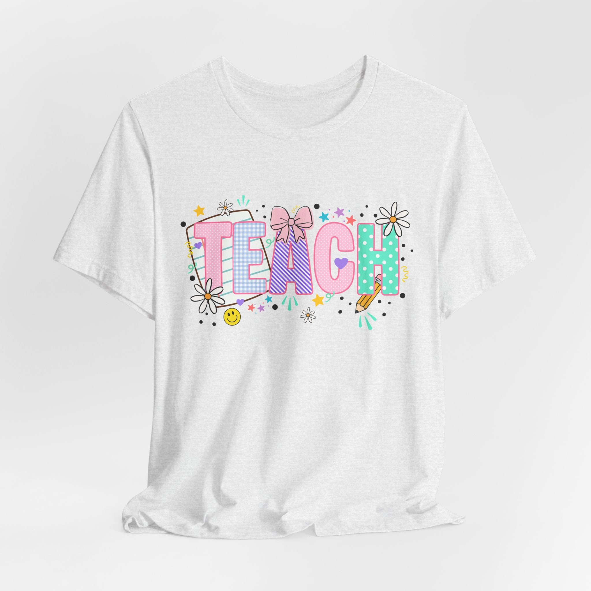 Teach Floral Graphic Tee — Cute Pastel "TEACH" Teacher T‑Shirt